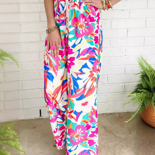 Leisure pants for women, wide, with a colorful floral pattern and an elastic waistband Lune London