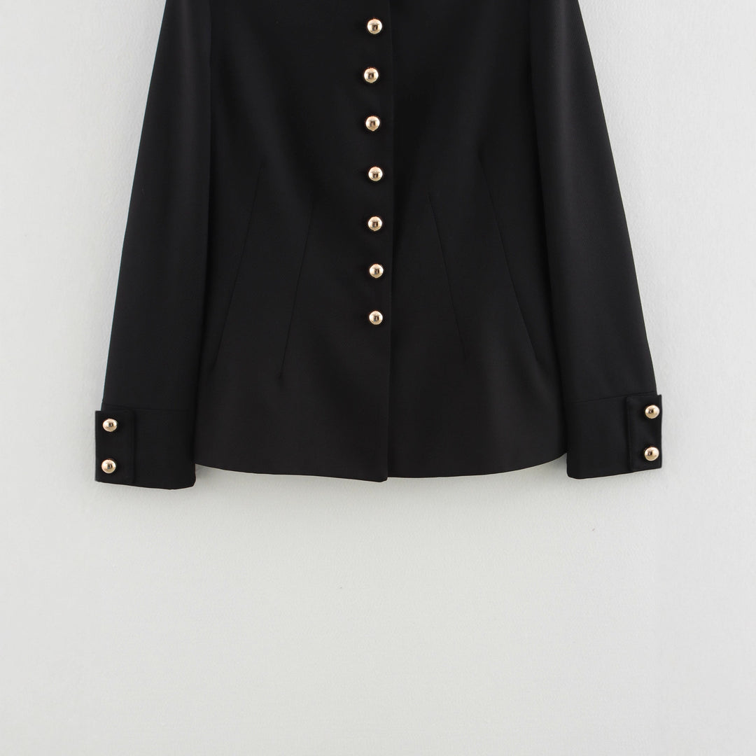 Elegant women's quilted jacket with high collar and gold buttons Lune London