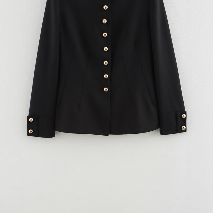Elegant women's quilted jacket with high collar and gold buttons Lune London