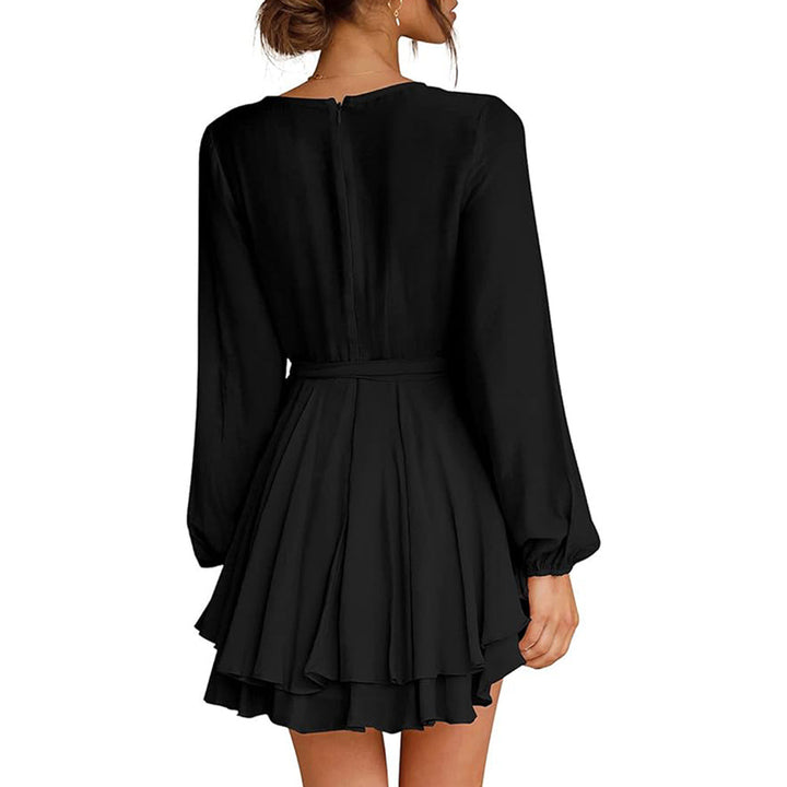 Robe portefeuille femme avec des manches longues et des volants espiègles Chic & Stil