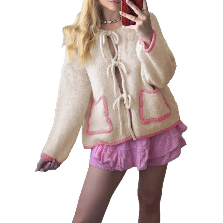 Ladies casual knit jacket with a unique tie detail and large pockets Lune London