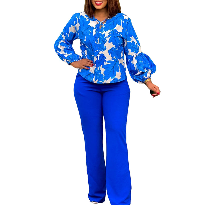Women Elegant set consisting of a casual blouse with voluminous sleeves and classic pants Lune London