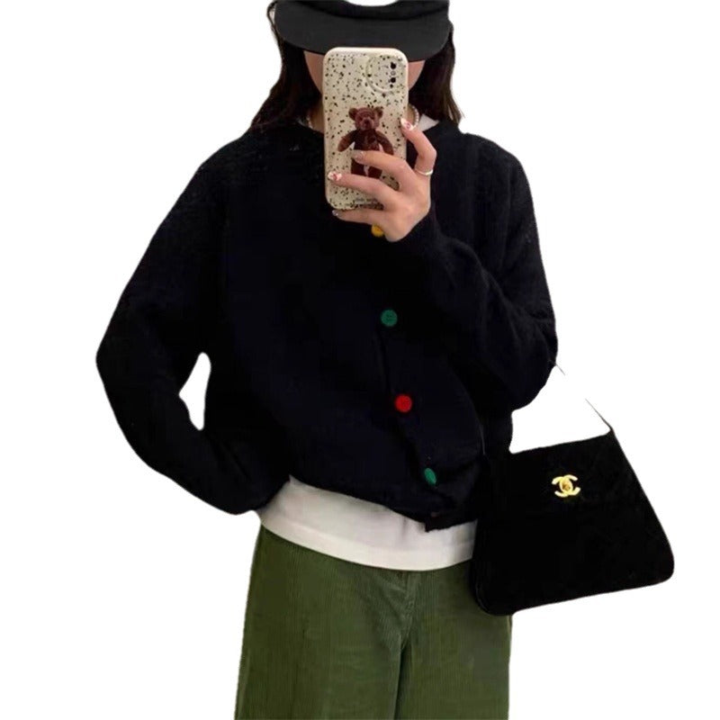 Ladies plush cardigan with colorful button details and a modern cut Lune London