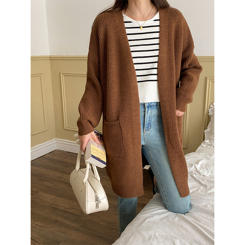 Women's cozy, lightweight knitted cardigan with two pockets Chic & Stil