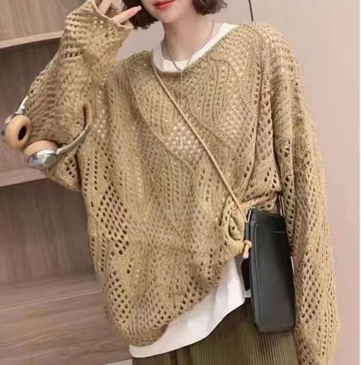 Chunky knit pullover for women with an innovative hole pattern and a relaxed fit Lune London