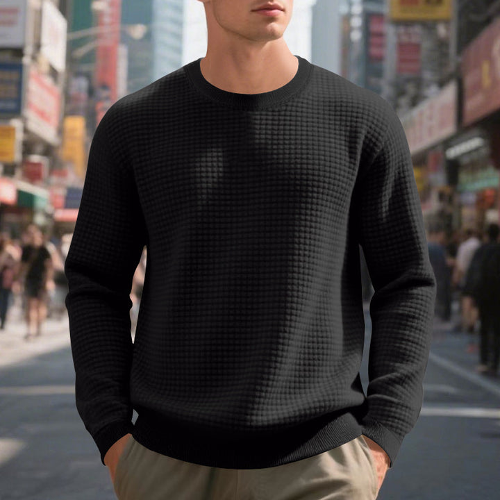 Elegant structured knit sweater for men with a round neck and comfortable feel. Chic and style