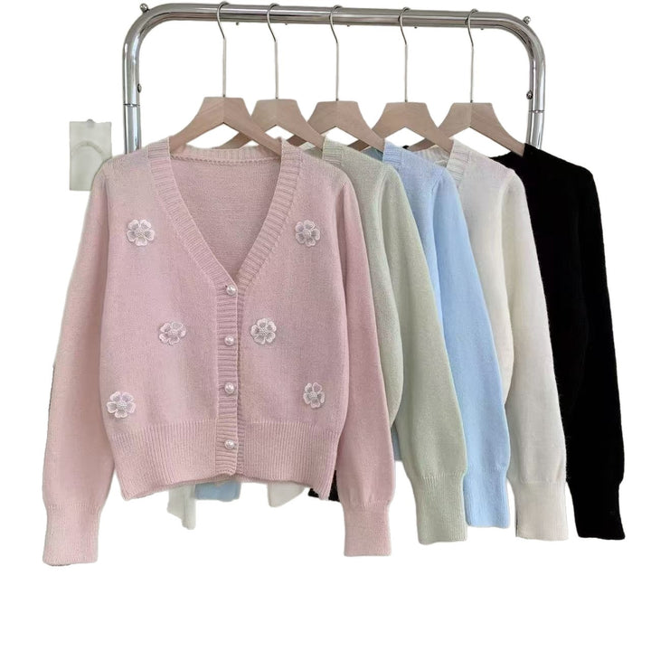 Ladies cozy knit vest with flower embroidery and pearl buttons Lune London