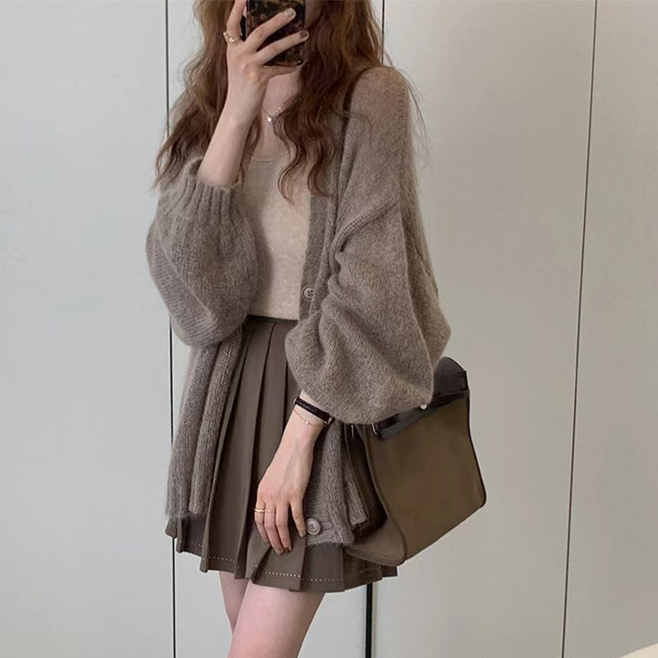 Elegant knit jacket with wide sleeves and refined details Lune London