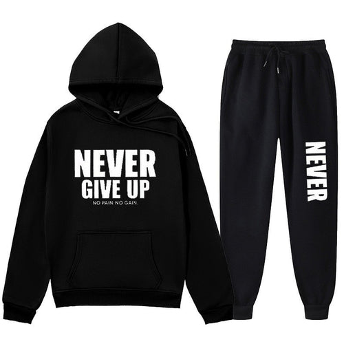 Women's training pullover and jogging pants in motif set with motivating print Chic & Stil