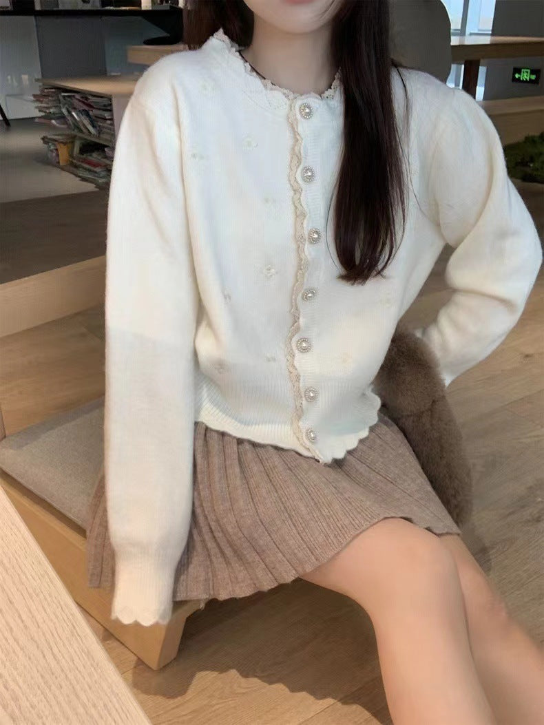 Ladies Elegant knitted cardigan with pearl buttons and structured design Lune London