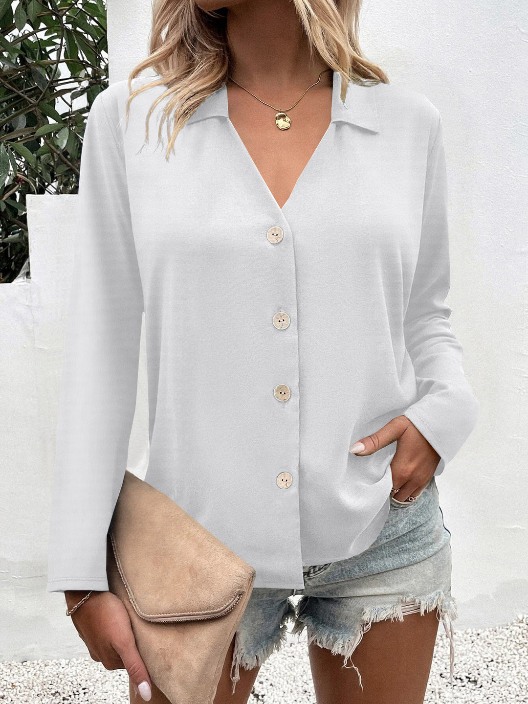 Trendy women's blouse with V-neck and button details Lune London