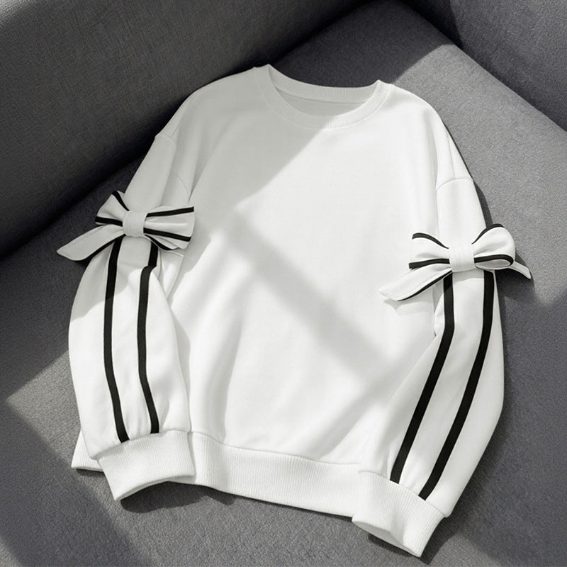 Elegant sweatshirt for women with bow sleeves Lune London