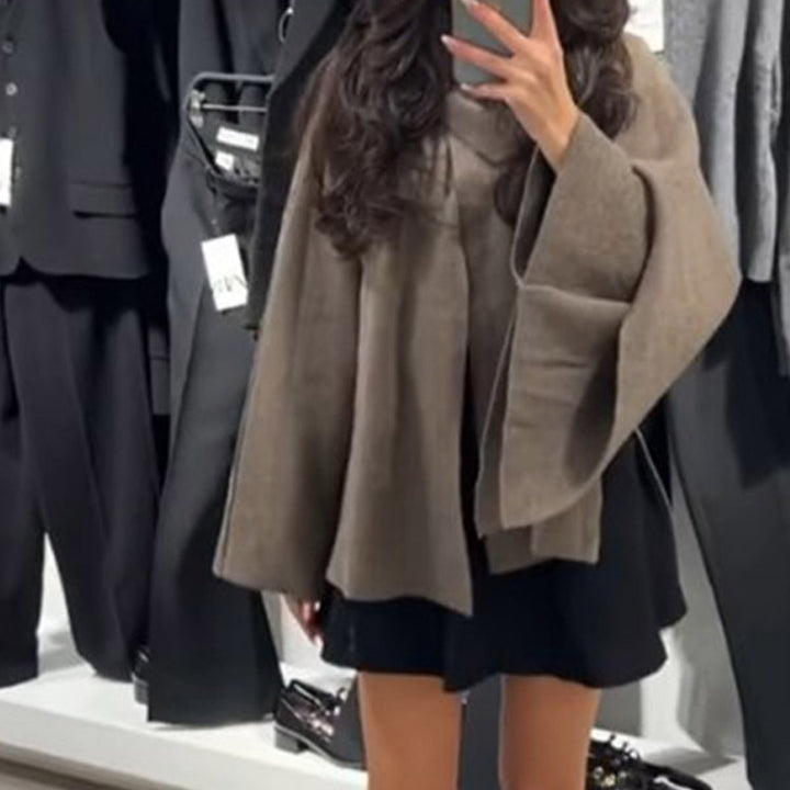 Ladies high-quality knit poncho with asymmetric design Lune London