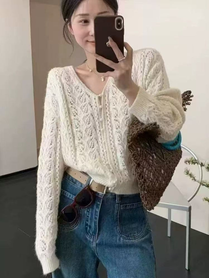 Women's knitted jacket with a delicate lace pattern and button details Lune London