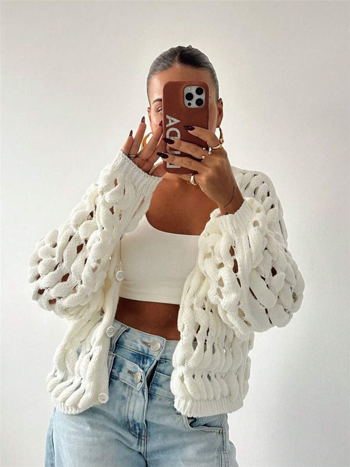 Women's knitted sweater with a unique hole pattern and a casual fit Lune London