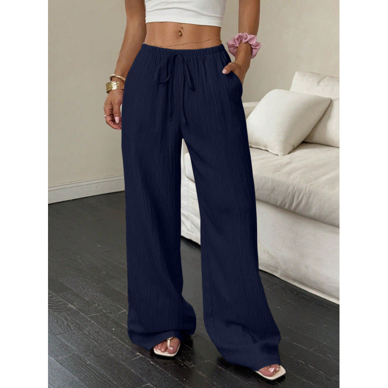 Casual and wide trousers for women with elastic waist and tie belt Lune London