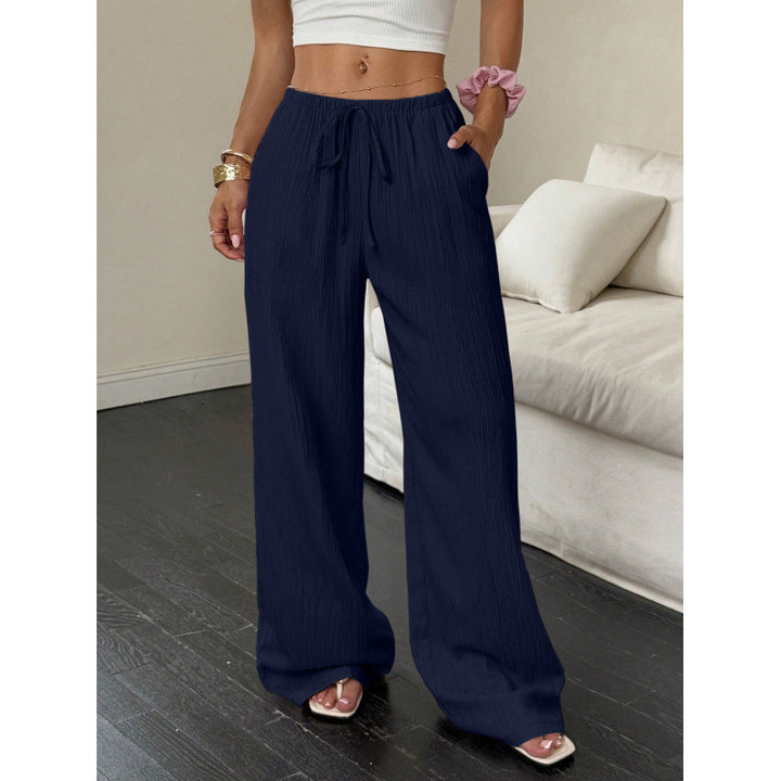 Casual and wide trousers for women with elastic waist and tie belt Lune London