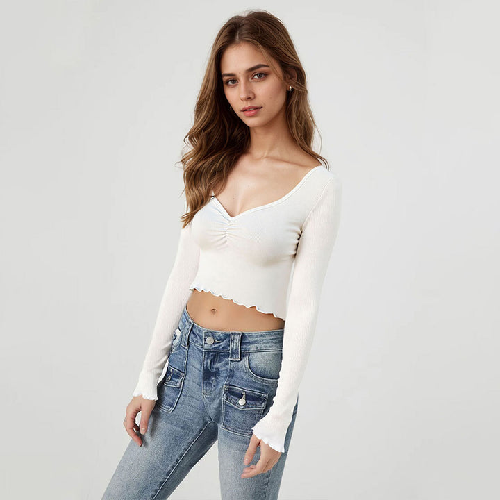 Short long-sleeve blouse for women with playful gathered hem Chic & Stil