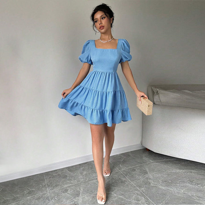 Robe pour femmes avec manches bouffantes et ourlet à volants Chic & Stil