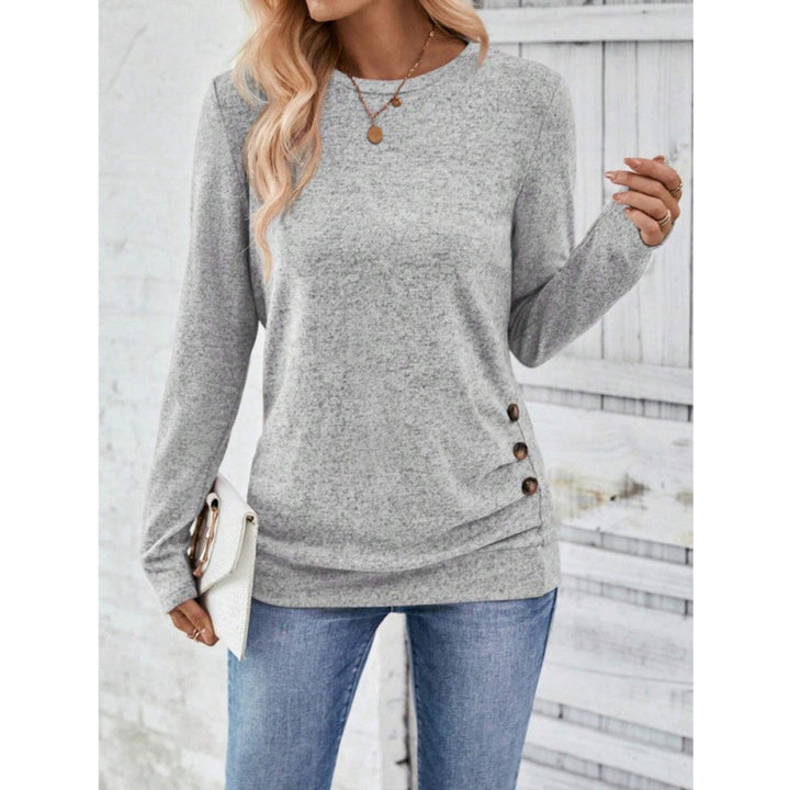 Fashionable women's top with button detail on the sides Lune London