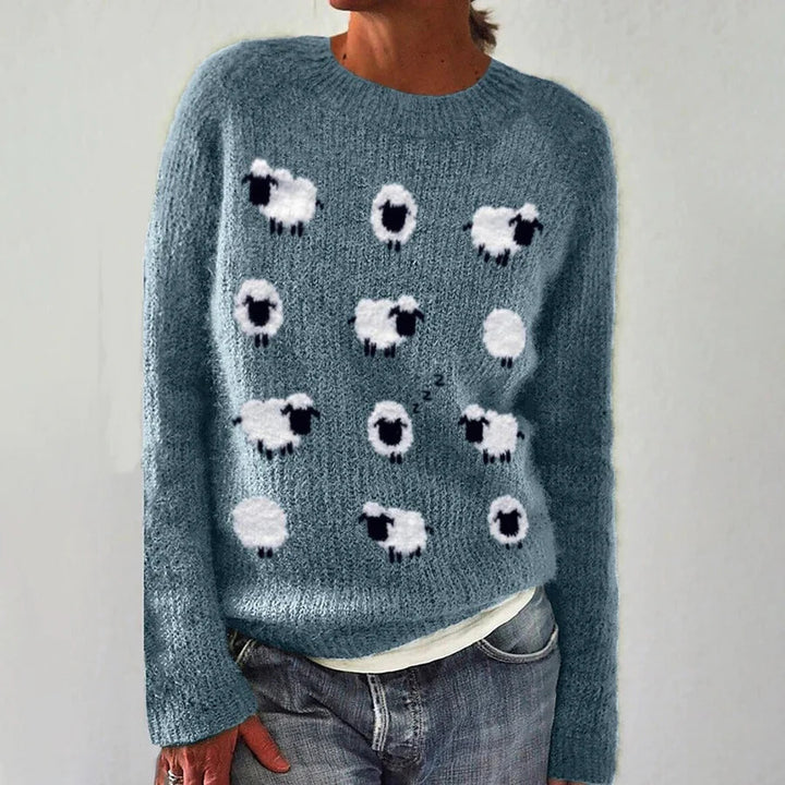 Pull pour femmes avec un design de mouton ludique et un matériau doux Chic & Stil