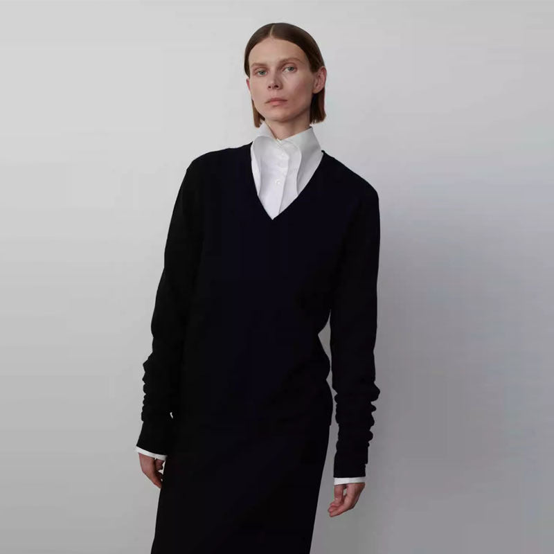 Pull élégant et décontracté en tricot pour femmes avec col en V et manches longues Chic & Stil