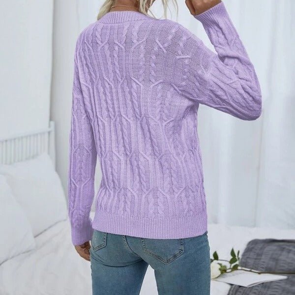 Ladies knit sweater with cable pattern demanding Lune London