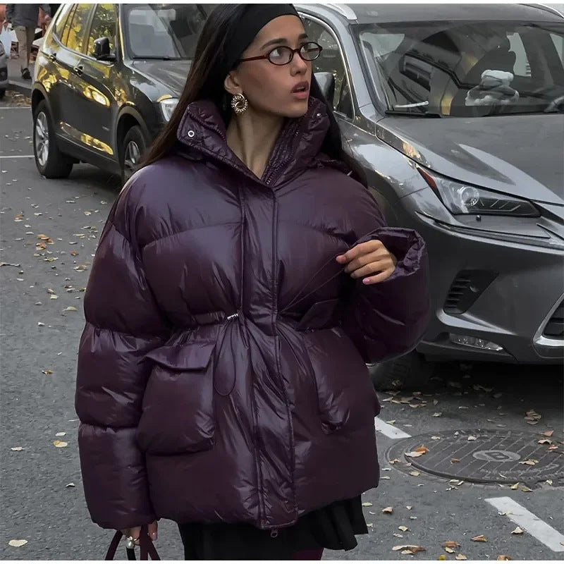 Oversized fashionable down jacket for women with a belted waist and side pockets Lune London