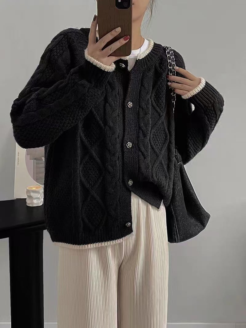 Thick knit women’s jacket with cable pattern and decorative buttons Lune London