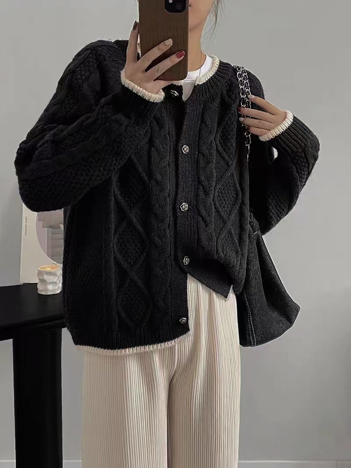 Thick knit women’s jacket with cable pattern and decorative buttons Lune London