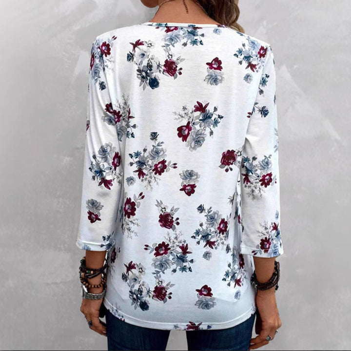 Blouse pour femmes avec imprimé floral et détails de boutons Chic & Stil