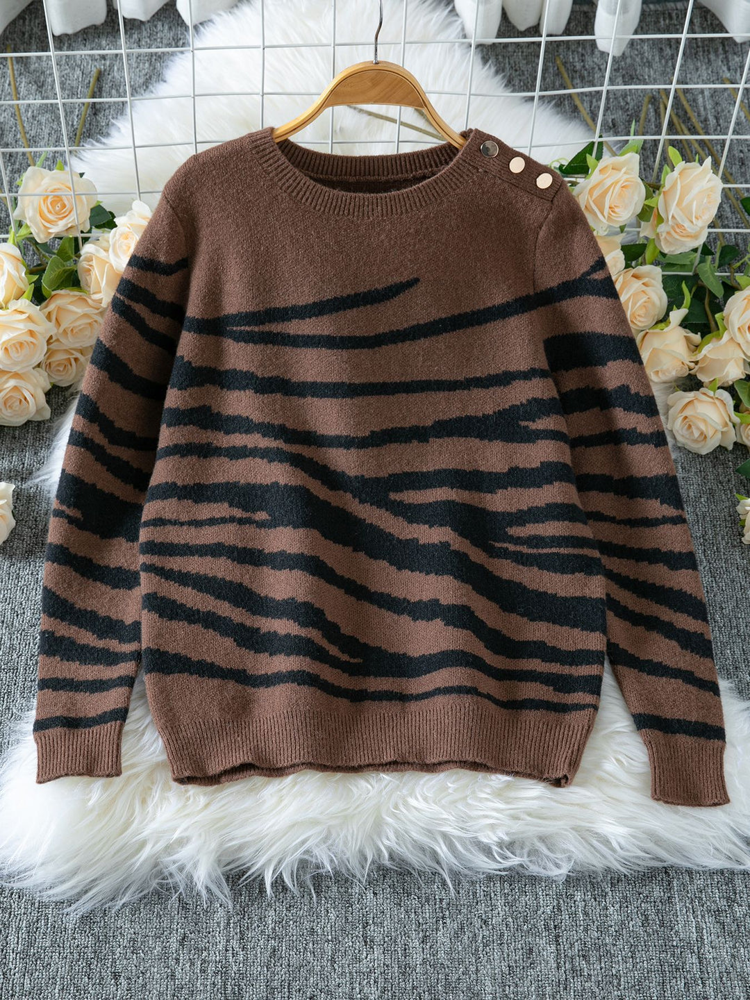 Comfortable knitted sweater for women with a modern zebra stripe pattern and a comfortable fit Lune London