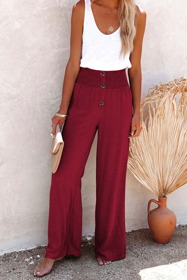 Loose summer trousers for women with elastic waist and button details Lune London