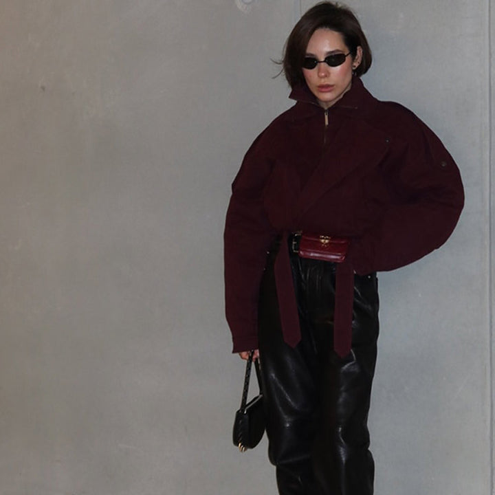Modern oversized jacket for ladies with a high collar and a waist belt Lune London