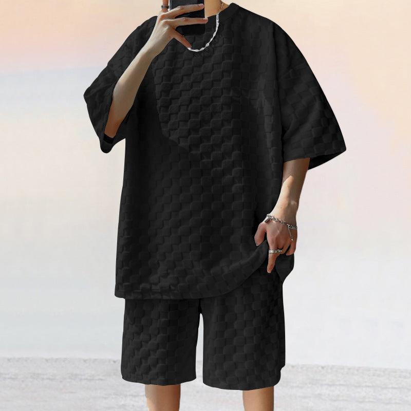 Casual men's outfit with checked pattern t-shirt and shorts Lune London