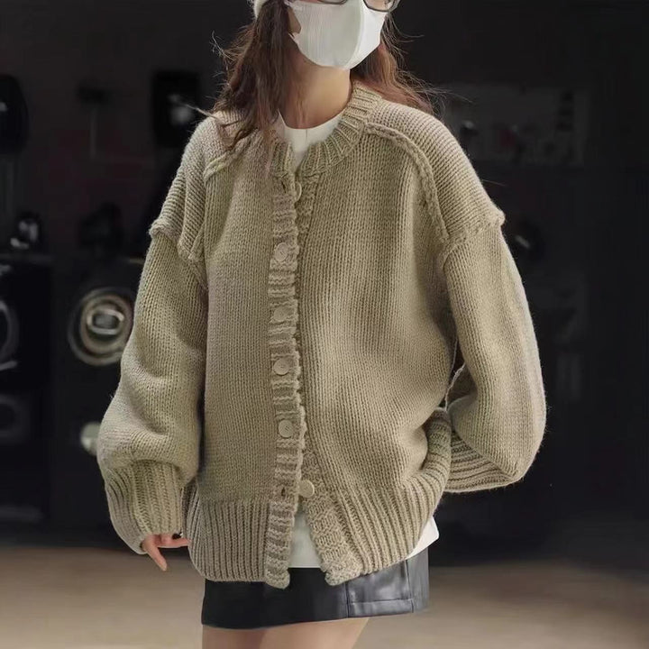 Oversized knitted jacket for women with special button details and wide sleeves Lune London