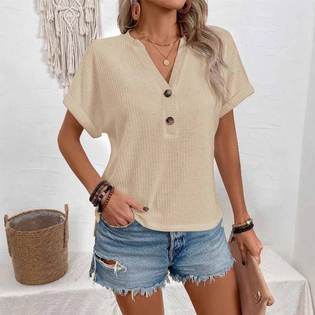 Casual short sleeve t-shirt for women with a decorative button placket design and a chic honeycomb texture