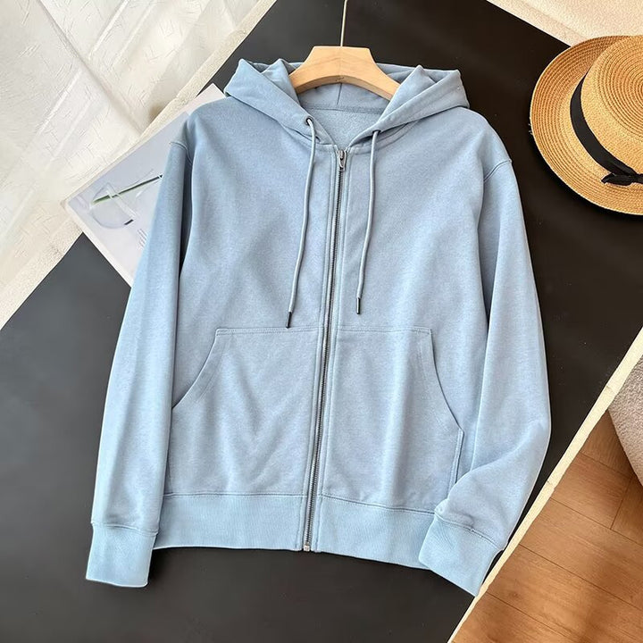 Veste à capuche zippée sportive pour femme avec poches kangourou pratiques Chic & Stil