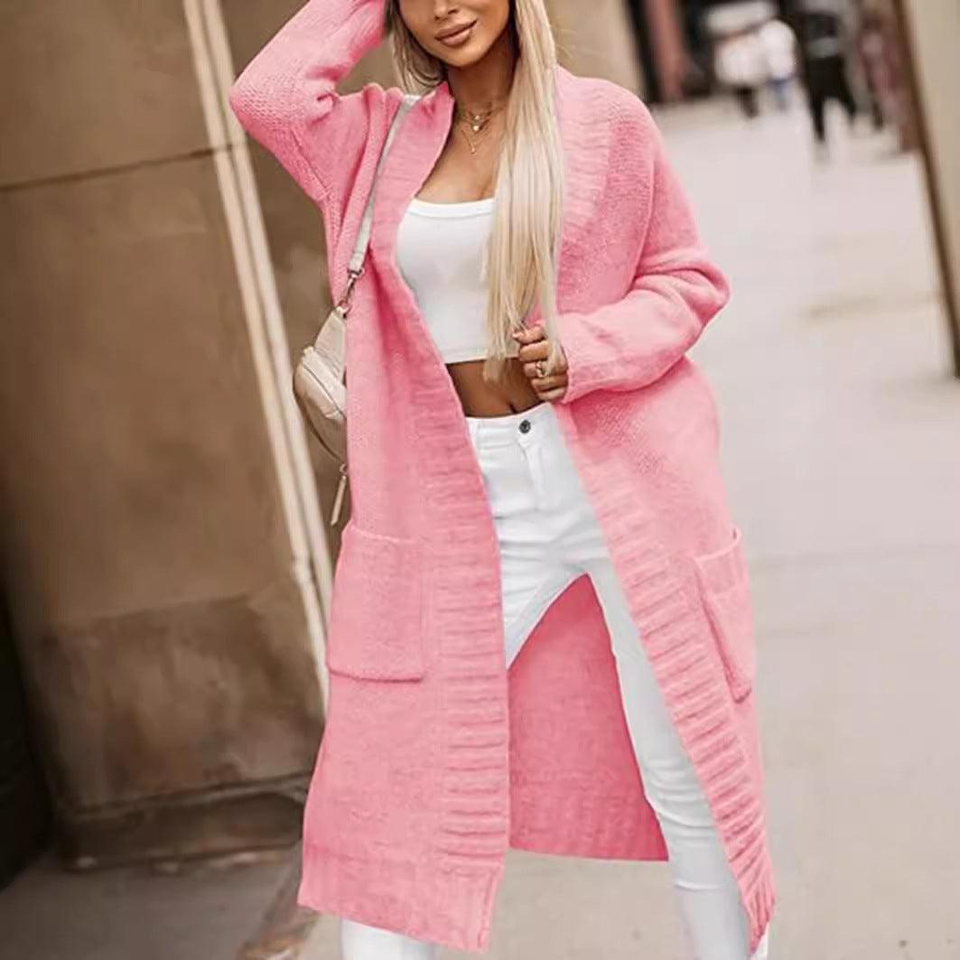 Long women's knitted coat with deep pockets and open cut Lune London