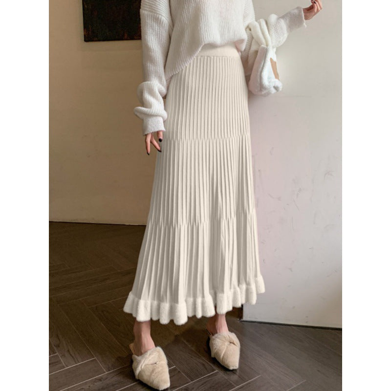 Jupe midi plissée pour femmes avec ourlet volumineux et ceinture élastique Chic & Stil