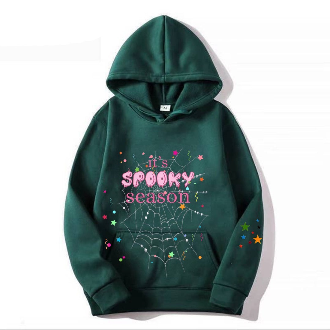 Women cozy hoodie with graphic Halloween design Chic & Stil