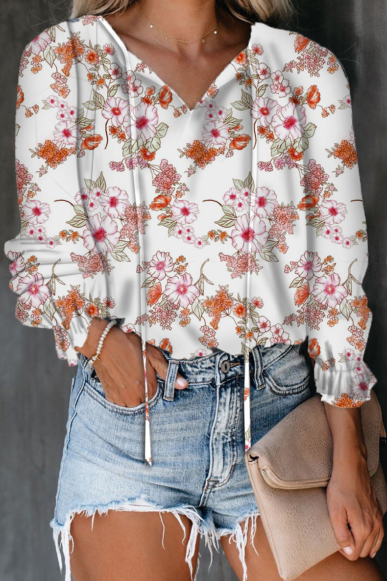 Blouse for women with ruffle details and a deep V neckline Lune London