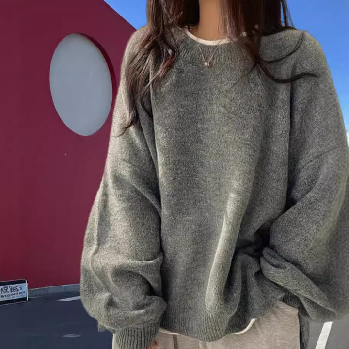 Oversized knit sweater for women with elegant puff sleeves and a modern design Lune London