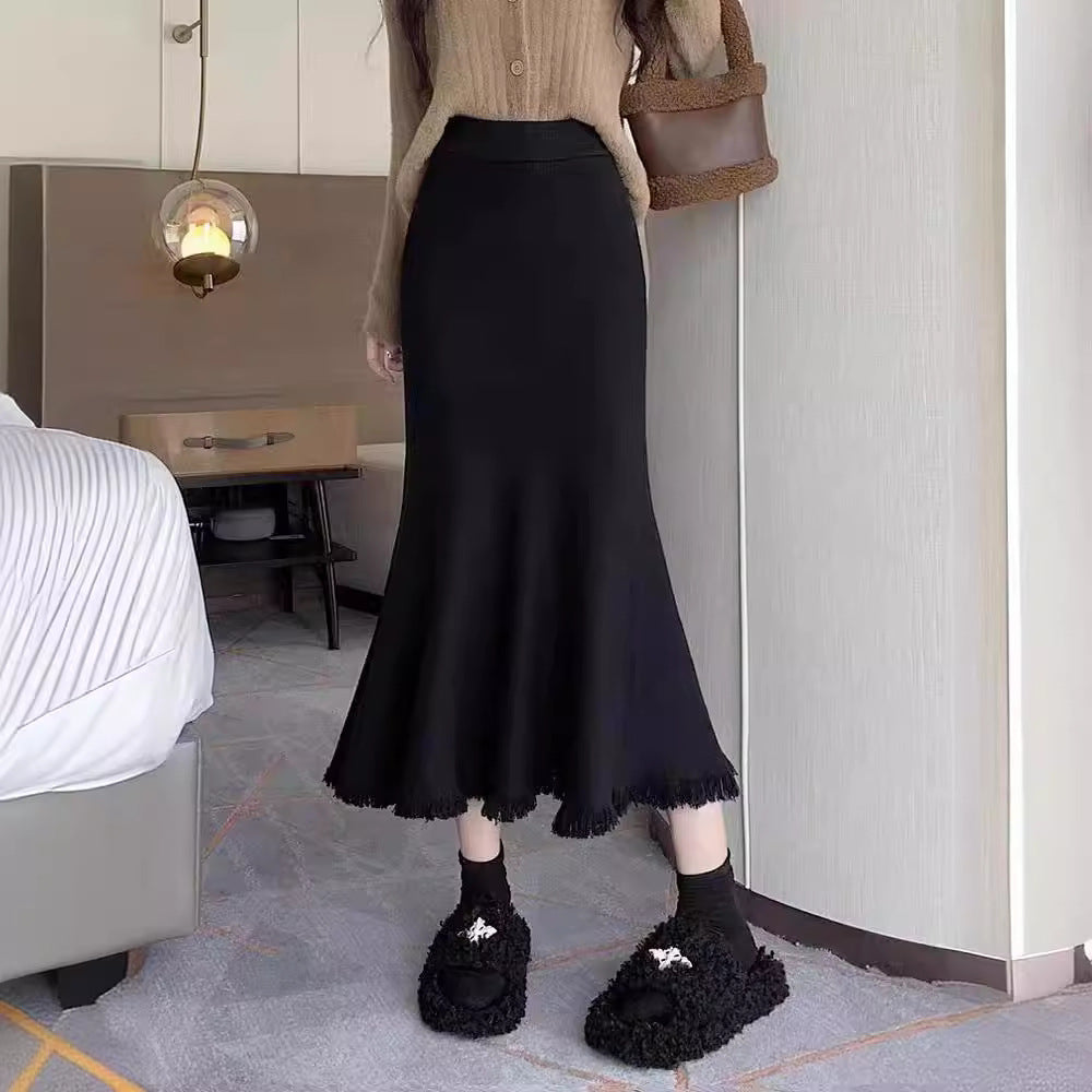 Elegant maxi skirt for women with voluminous hem and fringed details Lune London