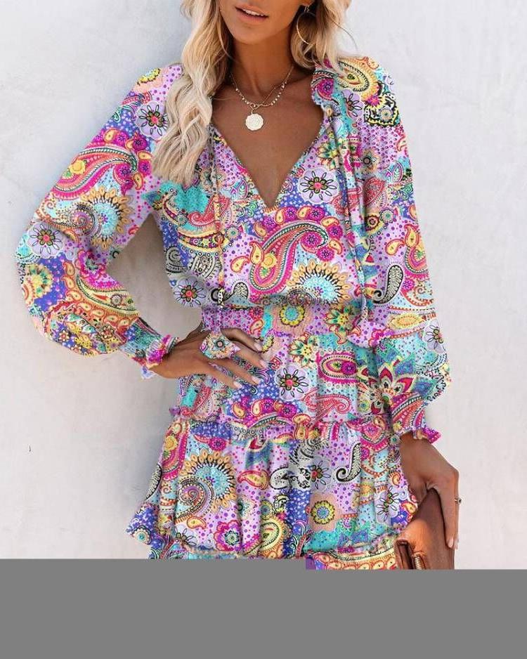 Ladies mini playful dress with colorful pattern and flounced details Lune London