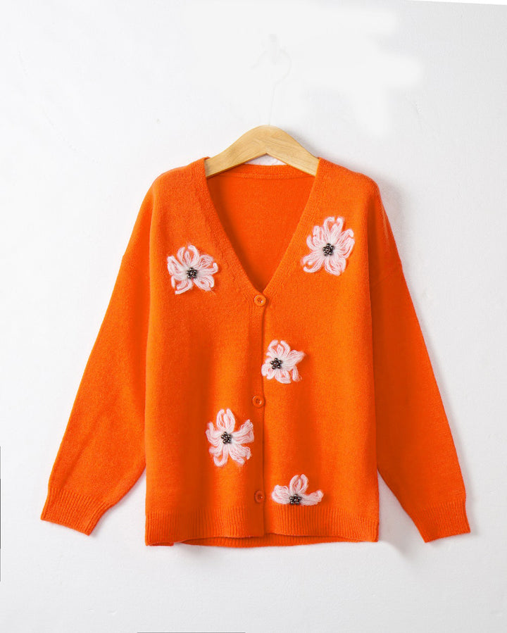 Women’s knitted jacket with floral pattern and elegant button placket Lune London