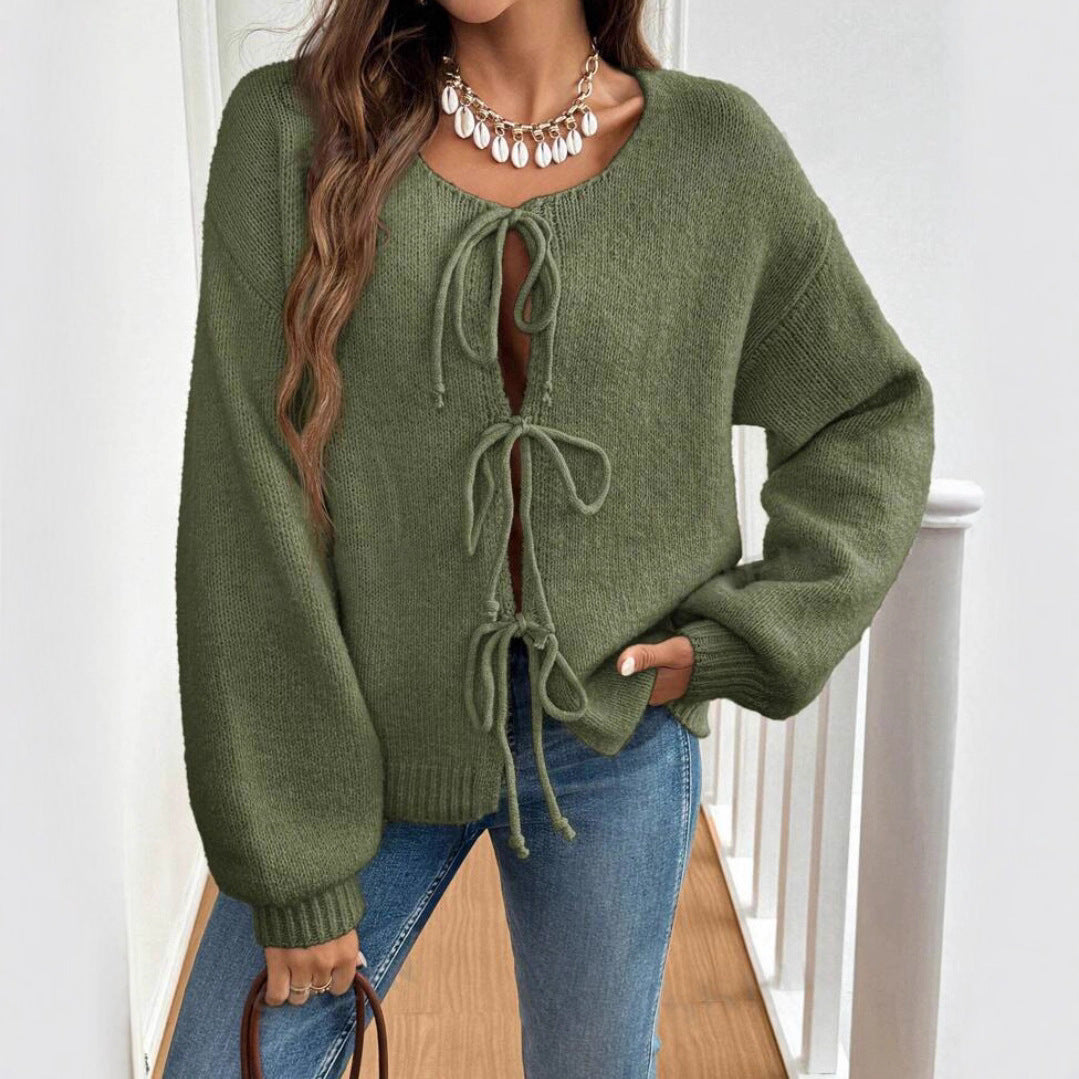Women's knit sweater with a decorative lace-up design and casual balloon sleeves Lune London