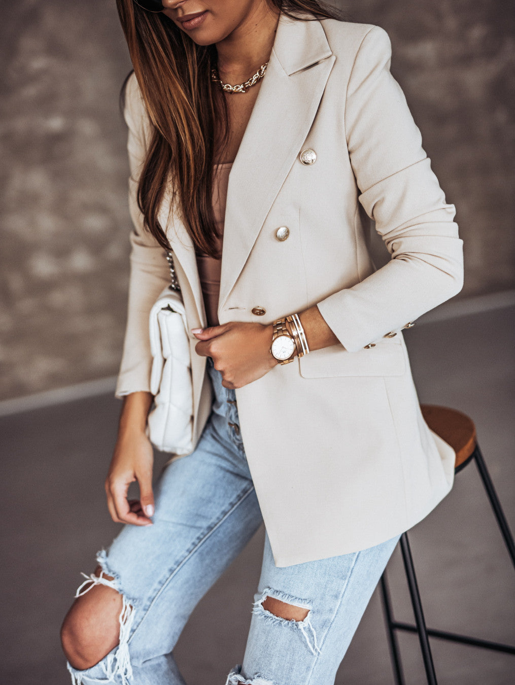 Ladies elegant blazer with double-breasted fastening and chic fashion accents