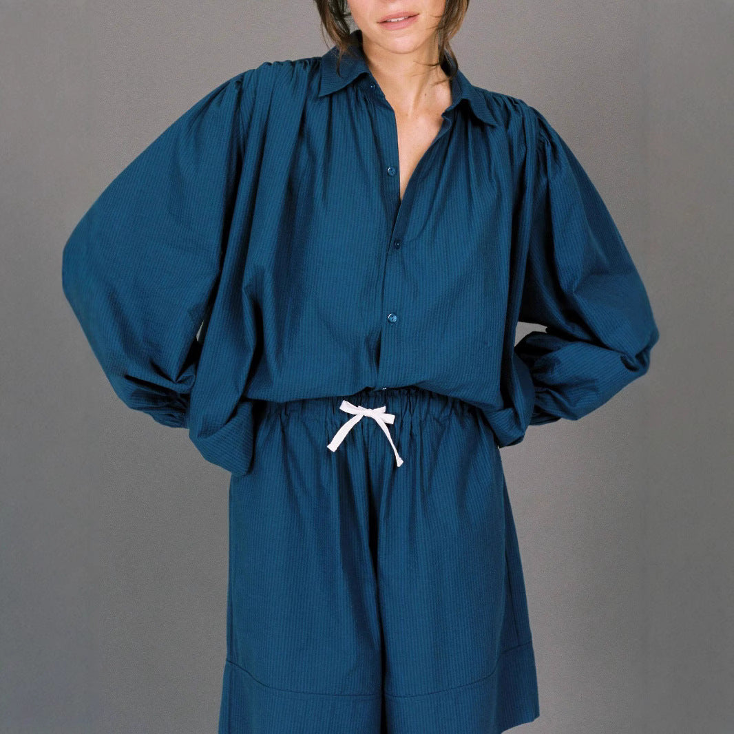 Woman casual outfit combined with loose blouse and shorts Lune London