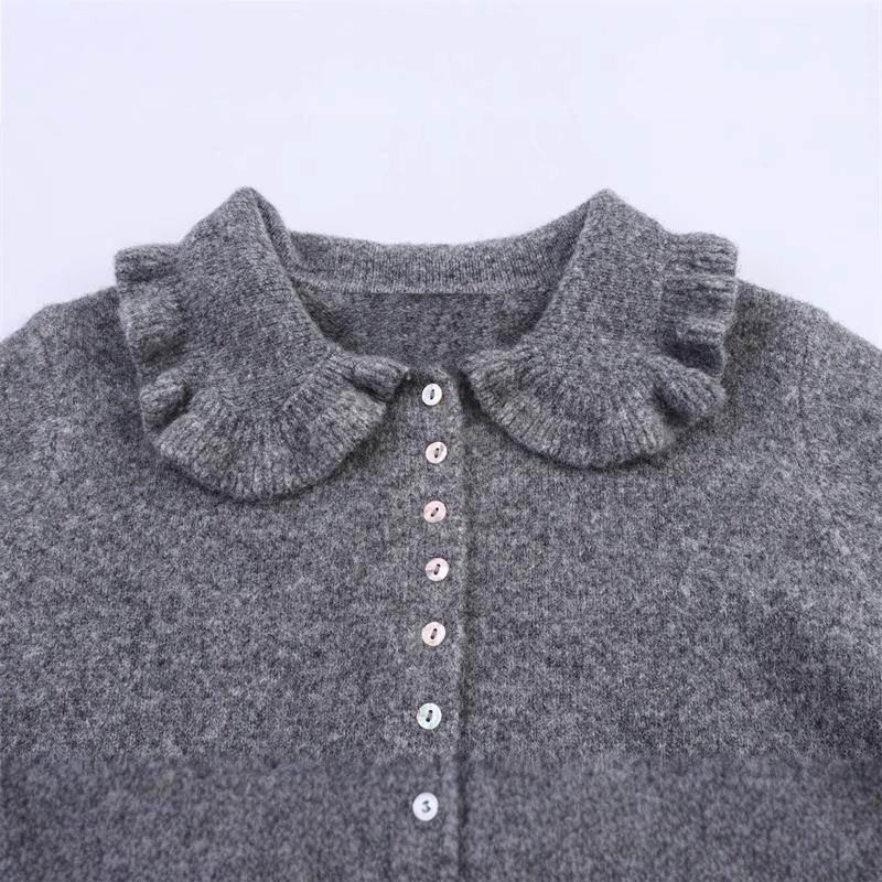 Knitted jacket for women with gathered finishes and a decorative collar Lune London